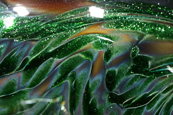 Detail of swirly vase, front-lit
